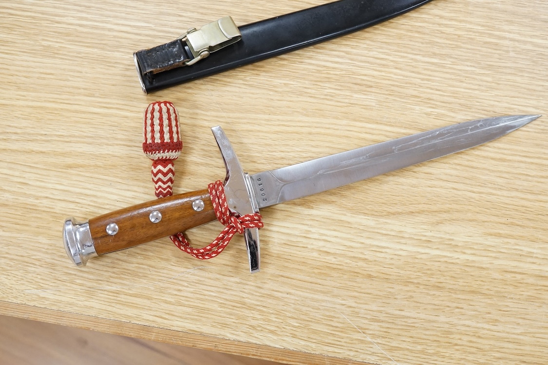 A post 1943 Swiss Army dagger, with knot and scabbard